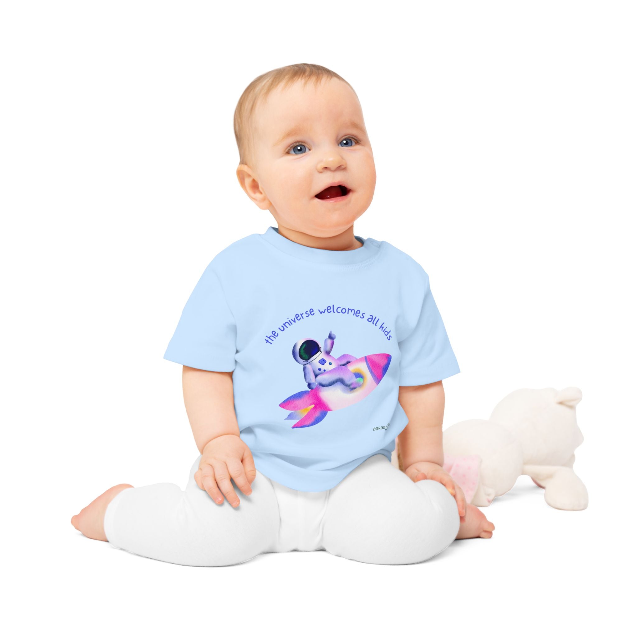 Baby T-Shirt — Rainbow Astronaut Rocket & Star Design (“The universe welcomes all kids” / “Kids are full of good stuff”)