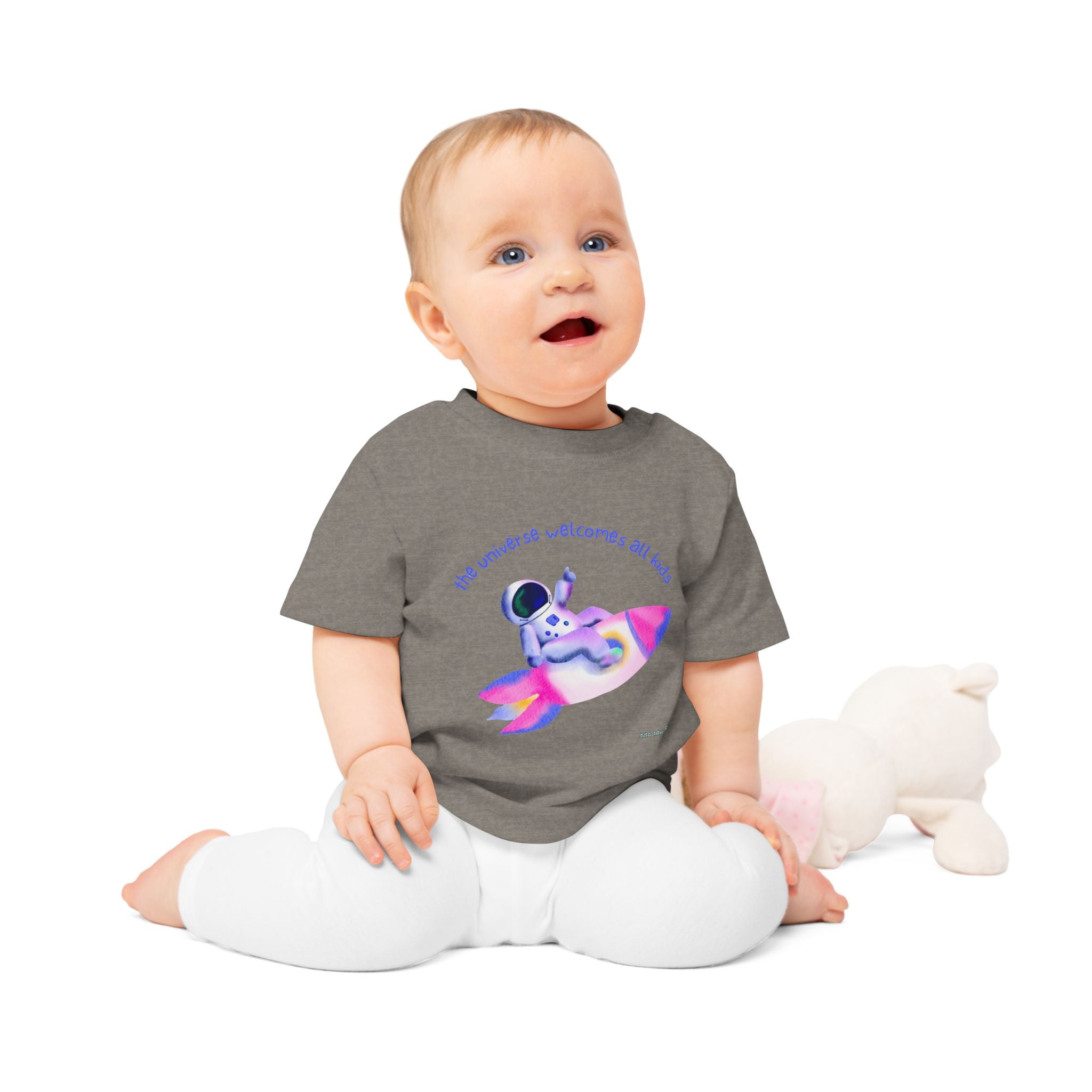 Baby T-Shirt — Rainbow Astronaut Rocket & Star Design (“The universe welcomes all kids” / “Kids are full of good stuff”)